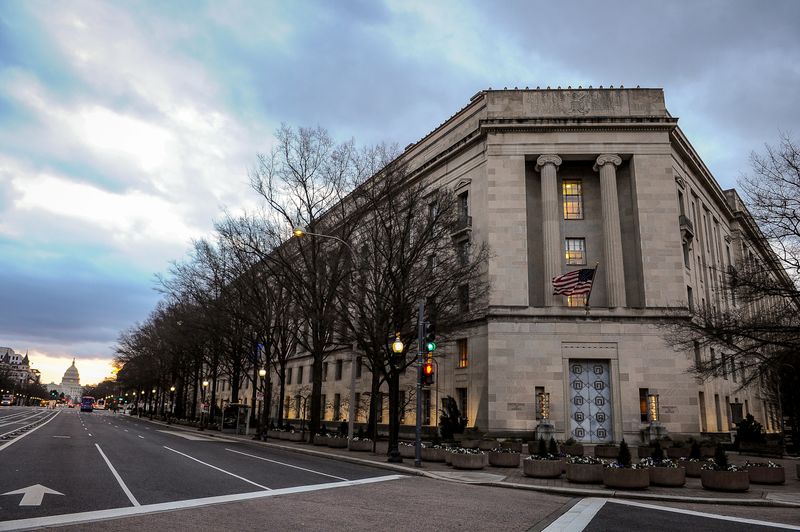 &copy; Reuters. The U.S. Department of Justice building is bathed in morning light at sunrise in Washington