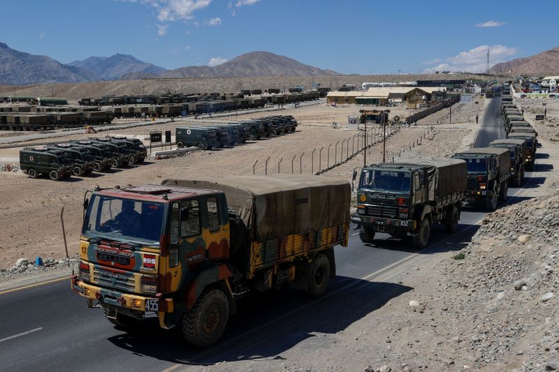 &copy; Reuters. Military trucks carrying supplies move towards forward areas in the Ladakh region