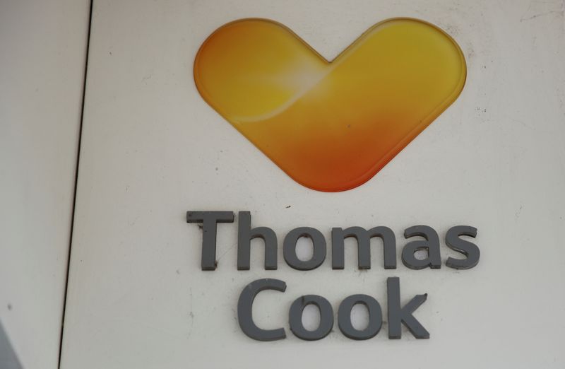 &copy; Reuters. FILE PHOTO: Signage is seen outside a closed Thomas Cook travel agents store near Manchester, Britain