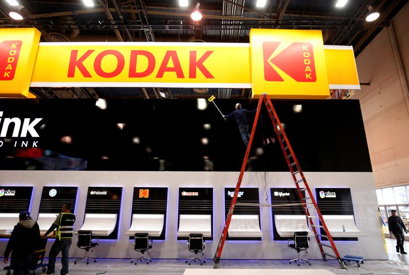&copy; Reuters. A worker cleans a Kodak booth at the Las Vegas Convention Center in preparation for 2019 CES in Las Vegas