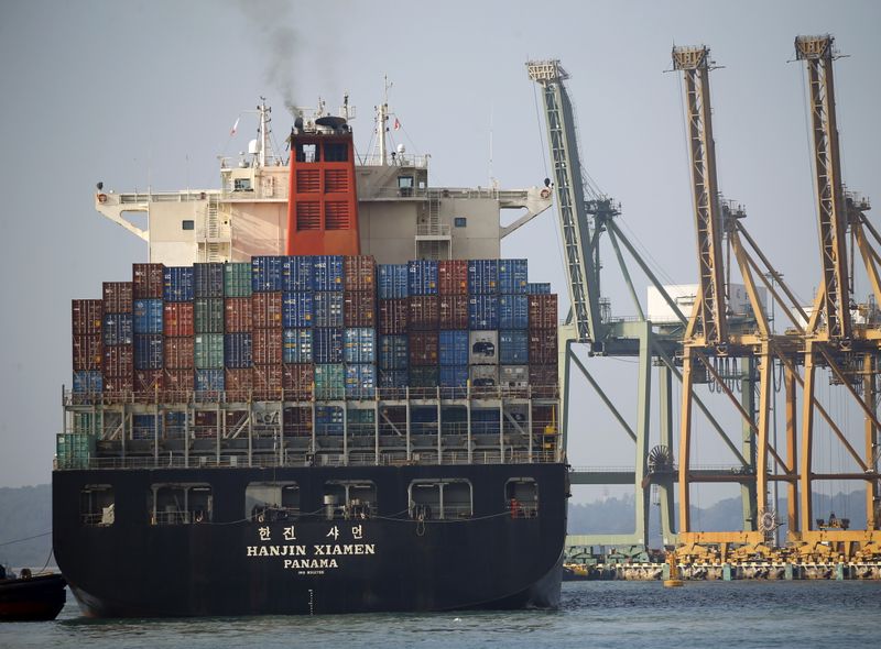 &copy; Reuters. A ship prepares to dock at PSA&apos;s Tanjong Pagar container port in Singapore