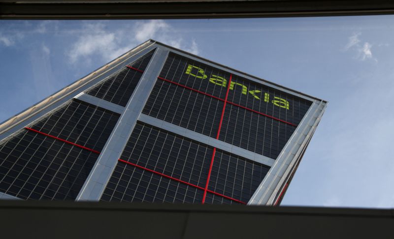 © Reuters. Headquarters of Spanish lenders Bankia is seen through a window in Madrid
