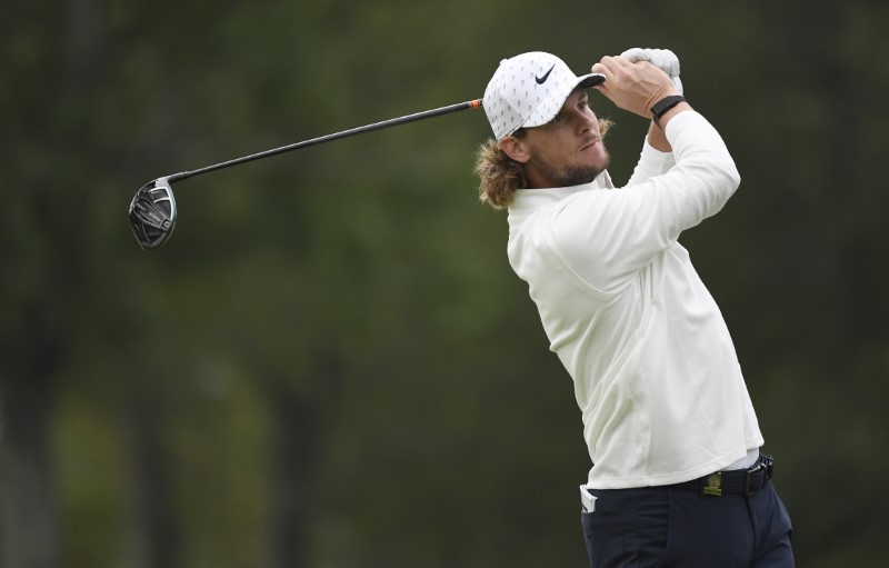DeChambeau grabs clubhouse lead as Winged Foot bares teeth