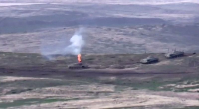 &copy; Reuters. A still image shows what is said to be a destroyed Azerbaijani armoured vehicle in Nagorno-Karabakh