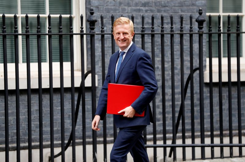 &copy; Reuters. FILE PHOTO: Britain&apos;s Digital, Culture, Media and Sport Secretary Oliver Dowden walks outside Downing Street in London