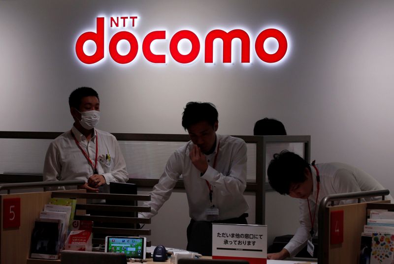 &copy; Reuters. FILE PHOTO: Logo of NTT Docomo is seen at its flagship shop in Tokyo