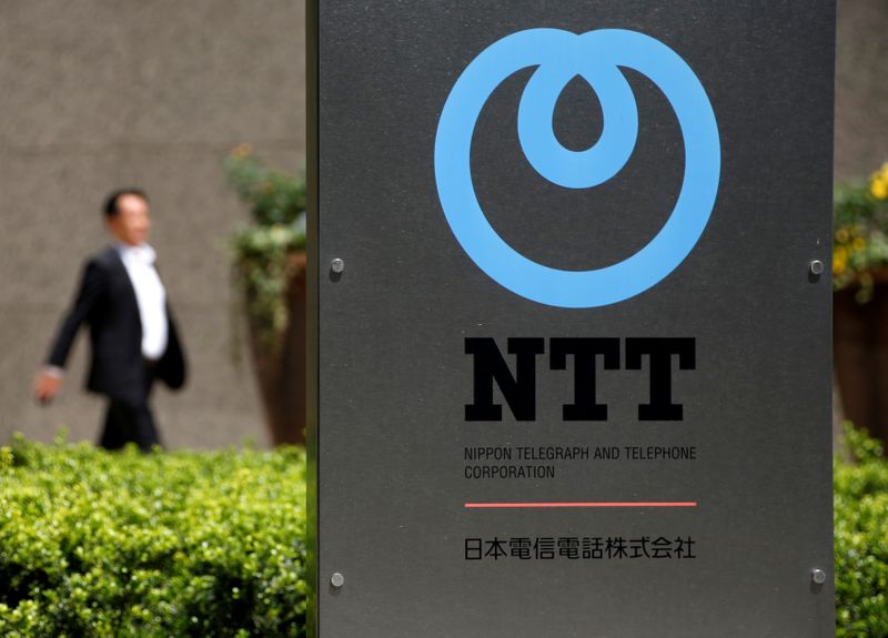 &copy; Reuters. The logo of NTT is didplayed at a building in Tokyo