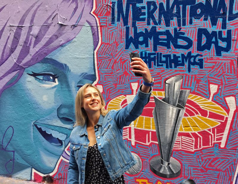 &copy; Reuters. FILE PHOTO: Australia all-rounder Ellyse Perry, the ICC Women&apos;s Cricketer of the Year, poses for a selfie in front of a mural promoting the Women&apos;s T20 World Cup tournament in Melbourne