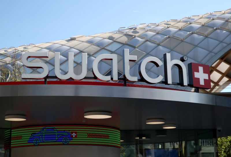 © Reuters. A Swatch logo is pictured in front of the newly built headquarters in Biel