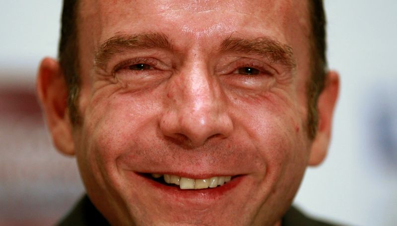 &copy; Reuters. FILE PHOTO: Brown smiles during a news conference held by the World AIDS Institute in Washington