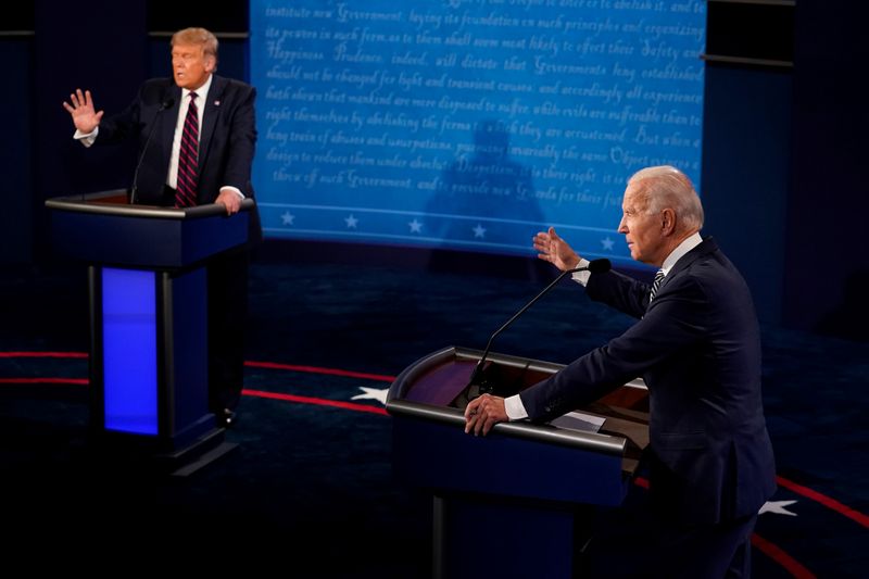 &copy; Reuters. U.S. President Donald Trump and Democratic presidential nominee Joe Biden participate in their first 2020 presidential campaign debate in Cleveland