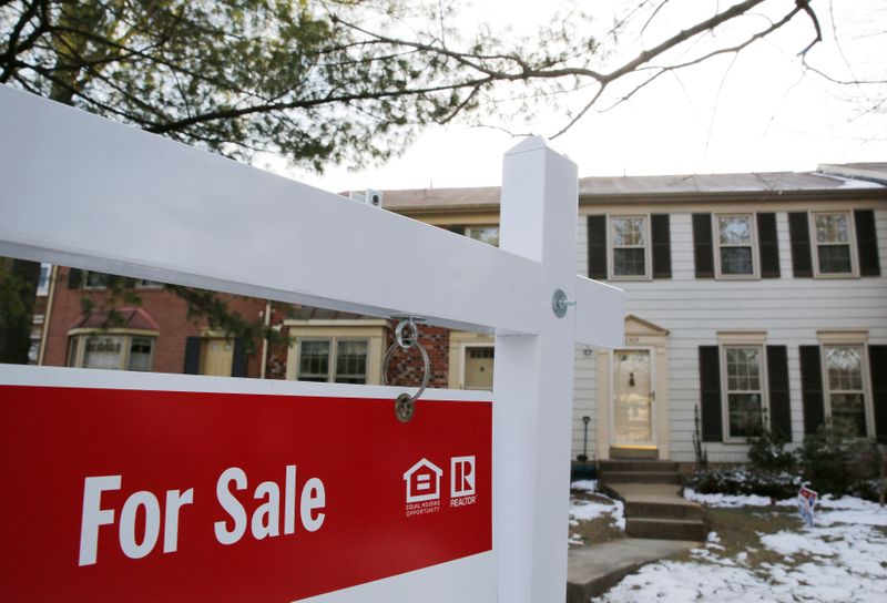 &copy; Reuters. Home for sale sign hangs in front of a house in Oakton, on the day the National Association of Realtors issues its Pending Home Sales for February report, in Virginia
