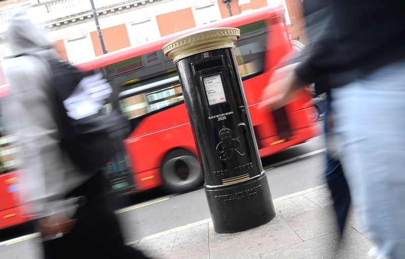 &copy; Reuters. Royal Mail postboxes painted black instead of traditional red to honour Black Britons, unveiled as part of the forthcoming Black History Month, in London, Britain
