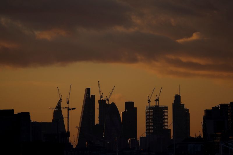 &copy; Reuters. FILE PHOTO: Skyscrapers stand at sunset in the city of London&apos;s financial district in London