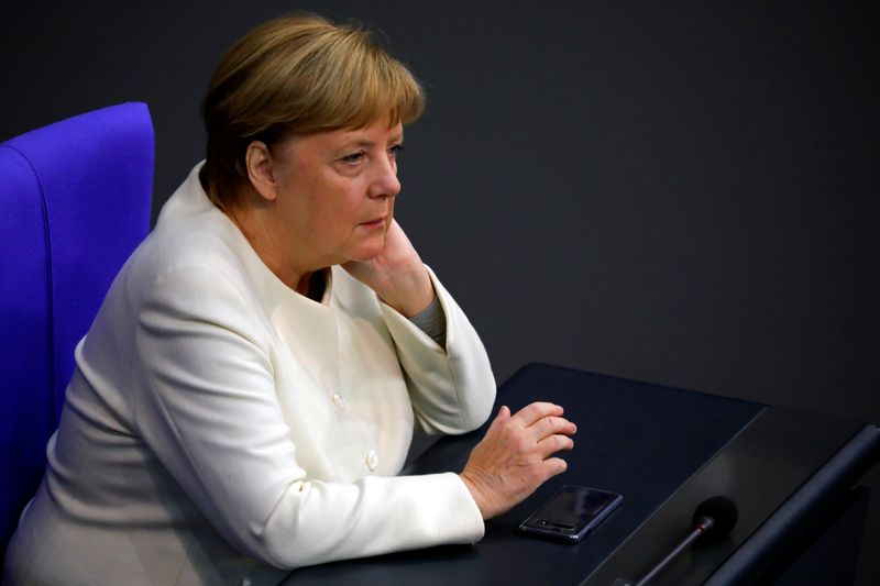 &copy; Reuters. FILE PHOTO: German Chancellor Angela Merkel attends a session of the Bundestag, in Berlin