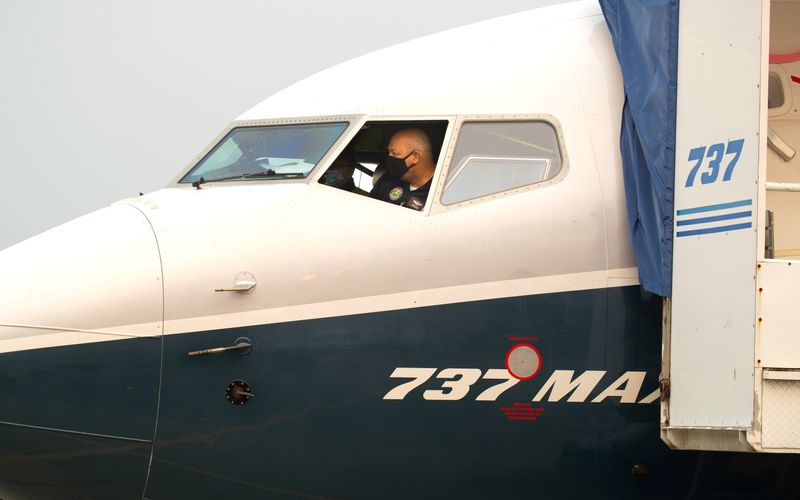 &copy; Reuters. FILE PHOTO: FAA Chief Steve Dickson conducts a pre-flight check in a Boeing 737 MAX aircraft in Seattle