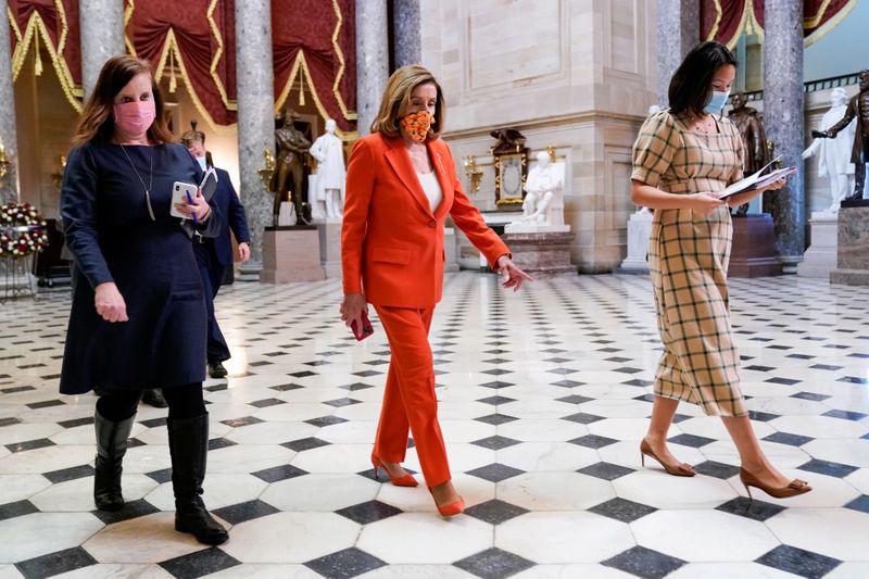 © Reuters. U.S. House Speaker Pelosi walks though the U.S. Capitol in Washington