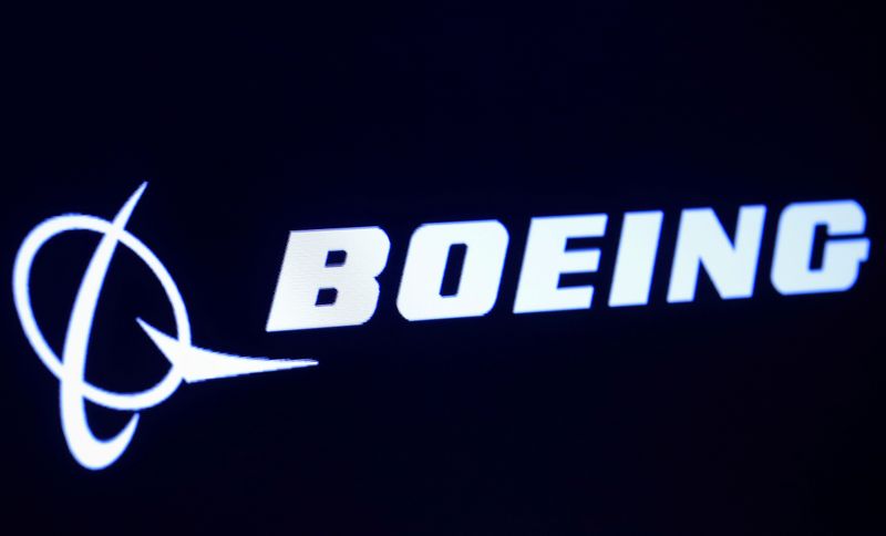&copy; Reuters. FILE PHOTO: The company logo for Boeing is displayed on a screen on the floor of the NYSE in New York