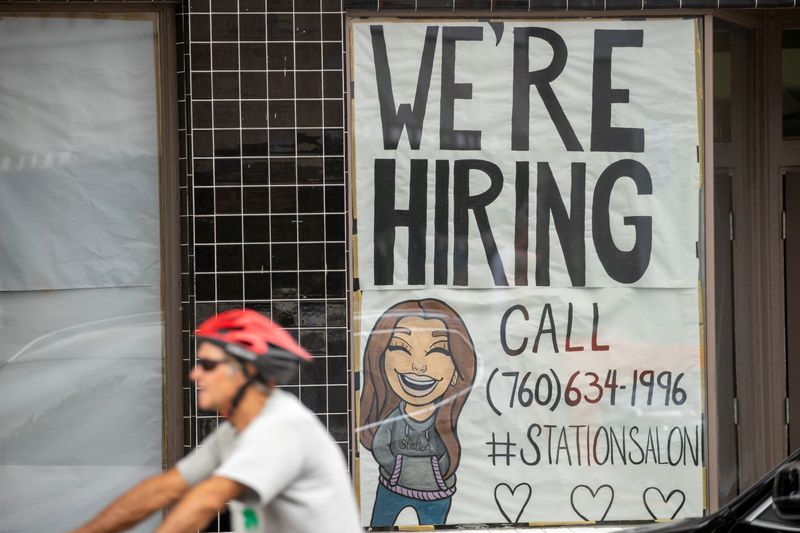 &copy; Reuters. FILE PHOTO: A new business advertises for workers as it prepares to open up during the outbreak of the coronavirus disease in California,