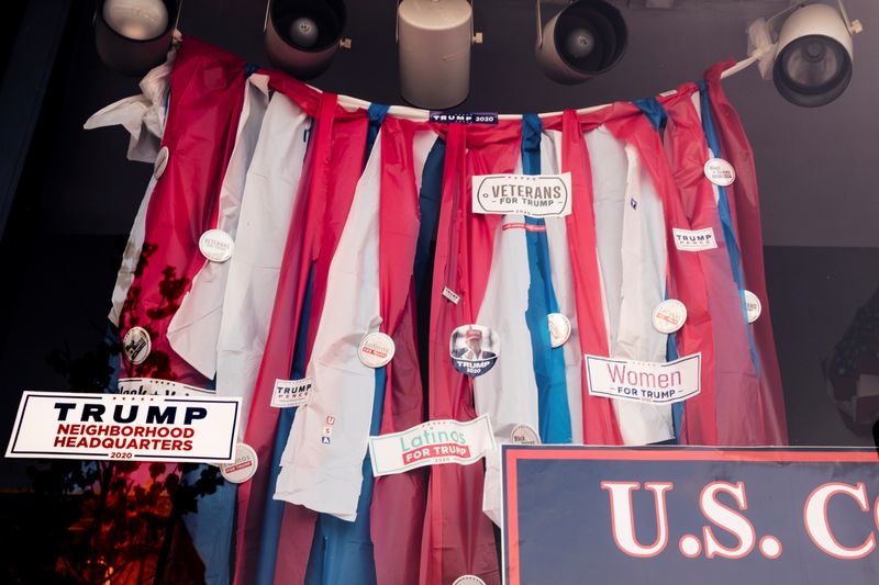 &copy; Reuters. A range of posters, colored ribbons, and stickers showing support to U.S. President Donald Trump headquarters hang on the heart of the historic Mitchell Street in Milwaukee