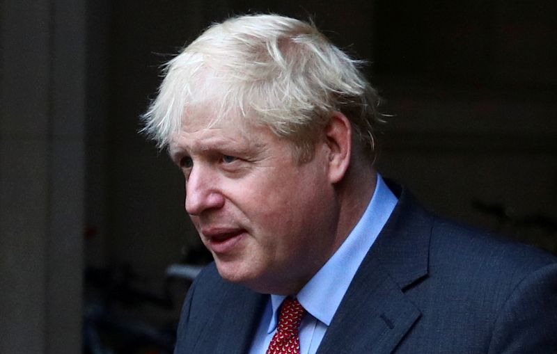 &copy; Reuters. FILE PHOTO: Britain&apos;s Prime Minister Boris Johnson leaves after a cabinet meeting, in London