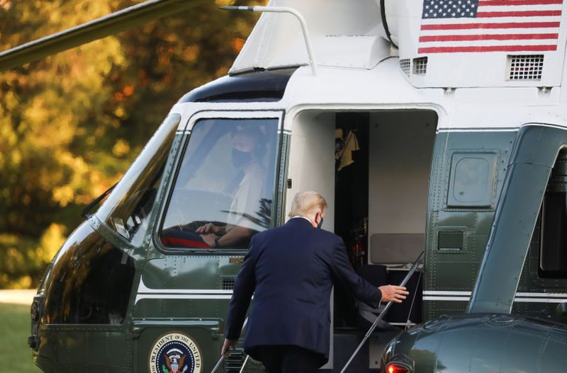 &copy; Reuters. FILE PHOTO: U.S. President Trump boards the Marine One helicopter as he departs for Walter Reed Medical Center from the White House in Washington