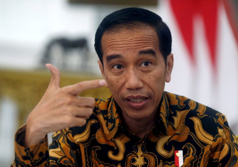 &copy; Reuters. FILE PHOTO: Indonesia&apos;s President Joko Widodo gestures during an interview with Reuters in Jakarta