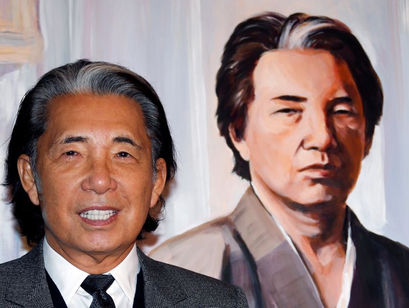 &copy; Reuters. FILE PHOTO: Japanese fashion designer Kenzo Takada poses next to a painting of his self-portrait offered to the &quot;Fight Aids&quot; foundation gala auction on World AIDS Day in Monaco