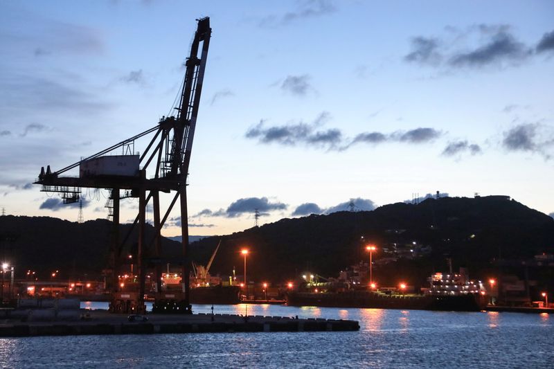 &copy; Reuters. FILE PHOTO: Cargo cranes are seen at Keelung Port during sunset hour in Keelung,