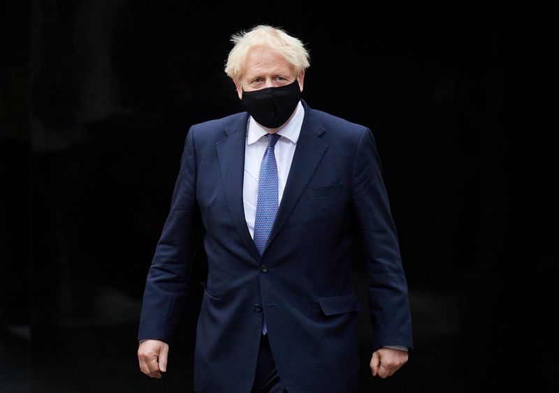 &copy; Reuters. Britain&apos;s PM Boris Johnson visits Octopus Energy, in London