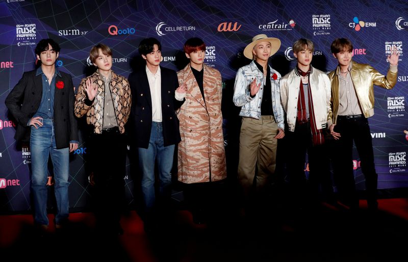 &copy; Reuters. FILE PHOTO: Members of South Korean boy band BTS pose on the red carpet during the annual MAMA Awards at Nagoya Dome in Nagoya