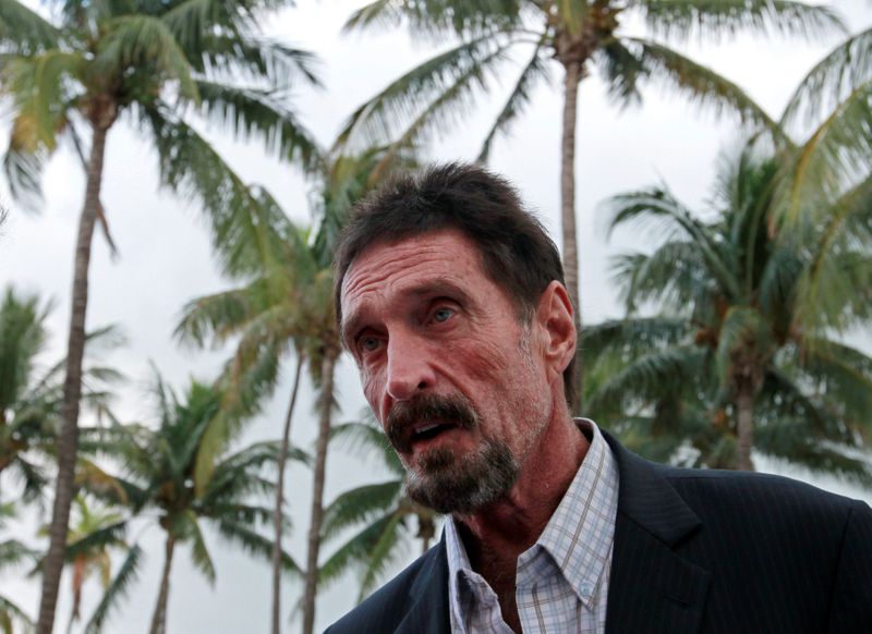 &copy; Reuters. FILE PHOTO: Computer software pioneer McAfee speaks with reporters outside his hotel in Miami Beach