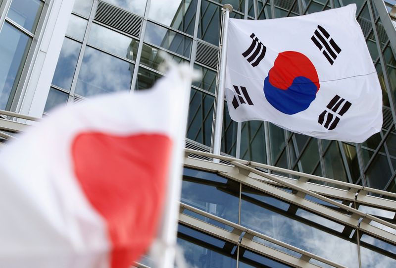 © Reuters. 日韓が8日から往来再開、ビジネス目的の長短期滞在者