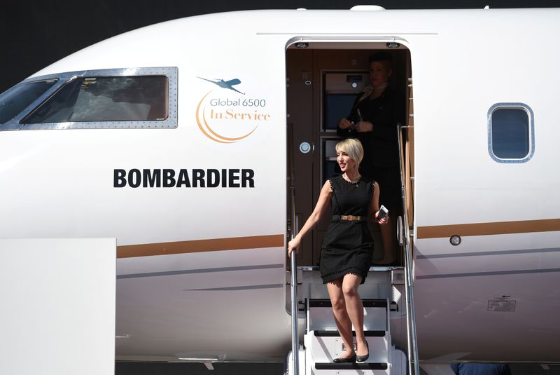 &copy; Reuters. FILE PHOTO: An attendee exits the Bombardier Global 6500 business jet at the National Business Aviation Association (NBAA) exhibition in Las Vegas