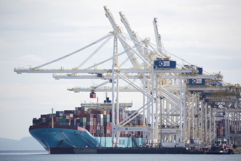 &copy; Reuters. FILE PHOTO: The ship Anna Maersk gets containers unloaded at Roberts Bank port including 69 containers of mostly paper and plastic waste returned by the Philippines