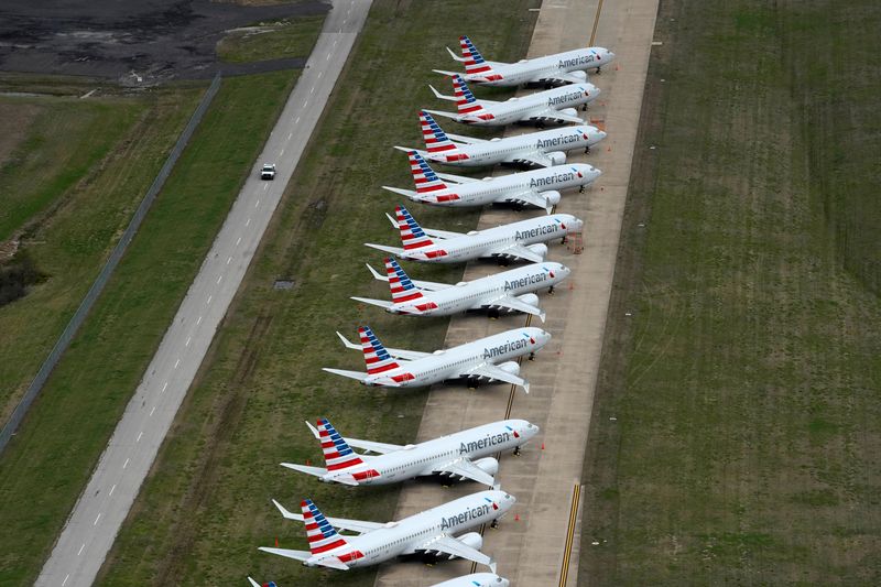 © Reuters. FILE PHOTO: American Airlines 737 max passenger planes are parked on the tarmac at Tulsa International Airport in Tulsa