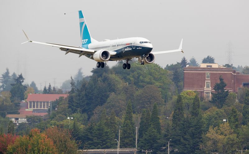 © Reuters. FAA Chief Steve Dickson returns in a Boeing 737 MAX aircraft in Seattle