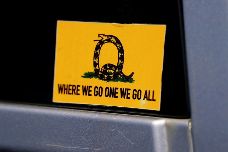 © Reuters. FILE PHOTO: A sticker that references the QAnon slogan is seen on a truck that participated in a caravan convoy in U.S. state of Georgia