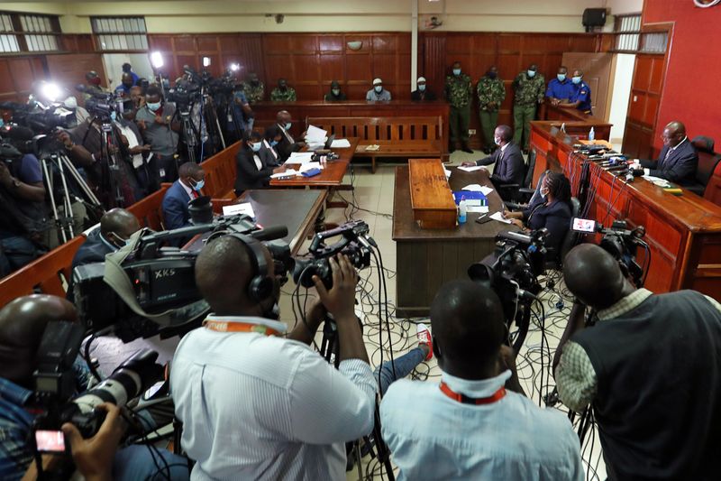 &copy; Reuters. Hussein Hassan, Liban Abdullah Omar and Mohamed Ahmed at court in Nairobi