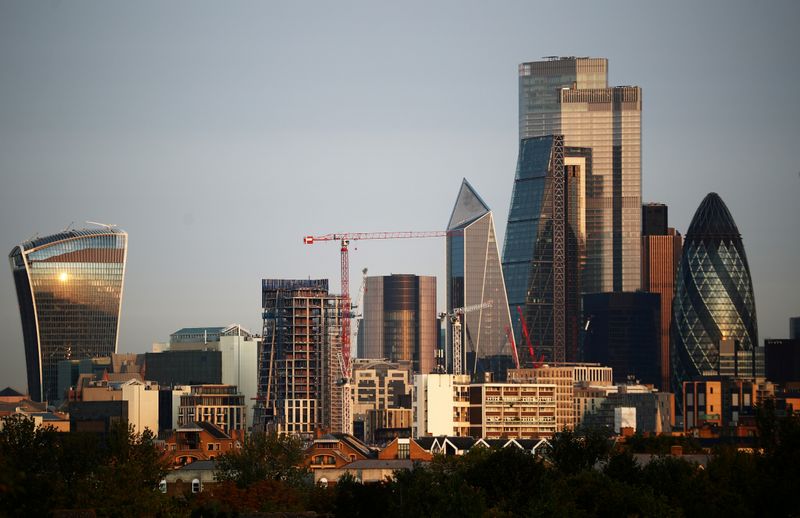 &copy; Reuters. FILE PHOTO: Skyscrapers in The City of London financial district are seen during sunrise in London
