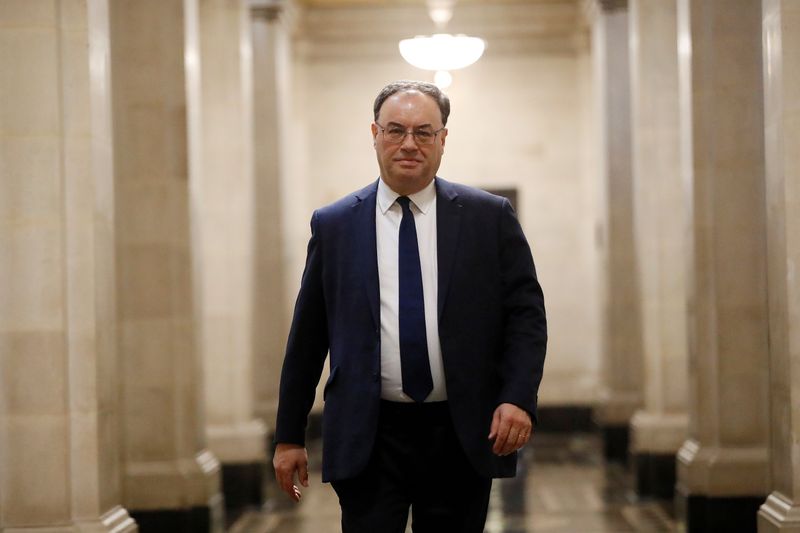 &copy; Reuters. FILE PHOTO: Bank of England Governor Andrew Bailey poses for a photograph on the first day of his new role at the Central Bank in London