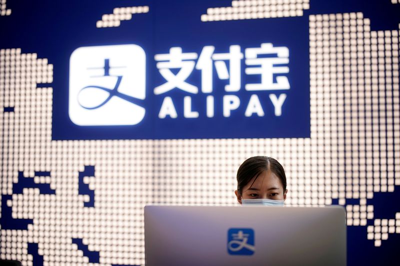 © Reuters. FILE PHOTO: Alipay logo is pictured at the Shanghai office of Alipay, owned by Ant Group which is an affiliate of Chinese e-commerce giant Alibaba, in Shanghai