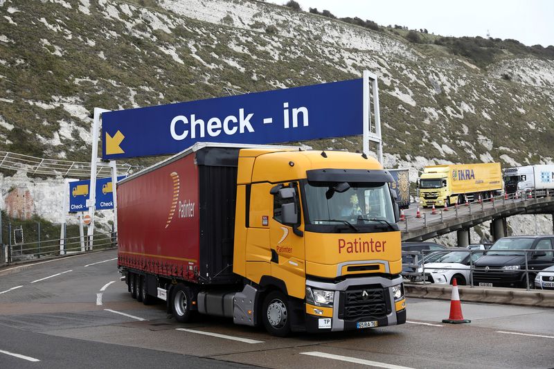 © Reuters. FILE PHOTO: Freight trucks move through the terminal at the Port of Dover