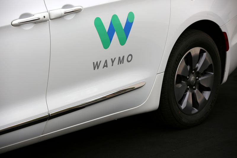 &copy; Reuters. FILE PHOTO: A Waymo Chrysler Pacifica Hybrid self-driving vehicle is parked and displayed during a demonstration in Chandler, Arizona