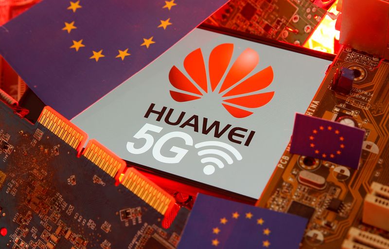&copy; Reuters. The EU flag and a smartphone with the Huawei and 5G network logo are seen on a PC motherboard in this illustration