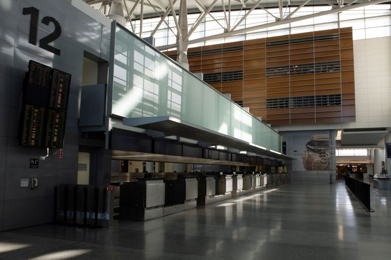 &copy; Reuters. FILE PHOTO: An empty International Terminal of San Francisco International Airport is pictured after the U.S. air travel ban, in San Francisco