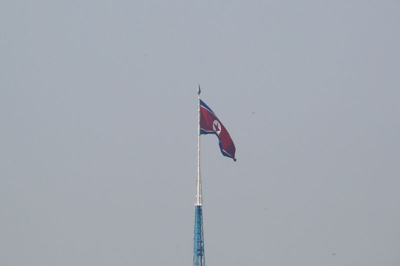 &copy; Reuters. A North Korean flag flutters on top of a tower at North Korea&apos;s propaganda village of Gijungdong, as seen from Paju