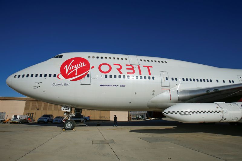 &copy; Reuters. Richard Branson&apos;s Virgin Orbit, with a rocket underneath the wing of a modified Boeing 747 jetliner, prior to its takeoff on a key drop test of its high-altitude launch system for satellites from Mojave, California