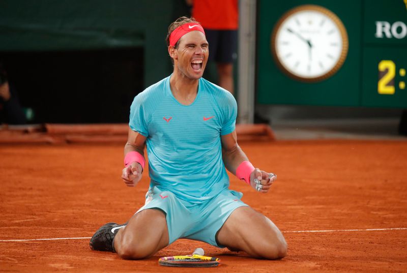 King Nadal continues Paris reign with record-equalling 20th Slam