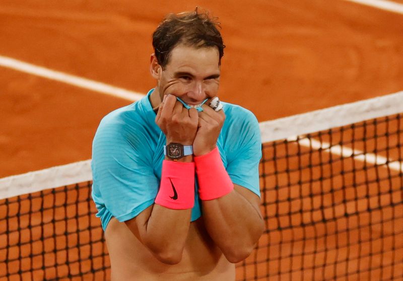 &copy; Reuters. نادال يحرز لقبه 13 في فرنسا المفتوحة ليحقق لقبه 20 بالبطولات الكبرى ويعادل الرقم القياسي
